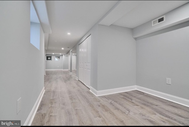 hallway featuring light wood-type flooring