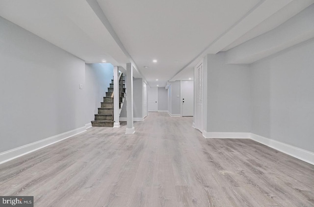 basement with light wood-type flooring