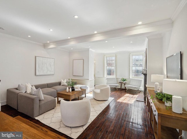 living room featuring light hardwood / wood-style floors, ornamental molding, and beamed ceiling