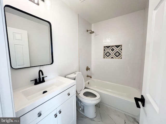 full bathroom with vanity, tiled shower / bath combo, and toilet