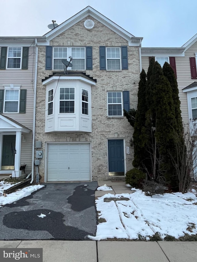 view of property with a garage