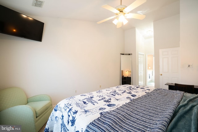 bedroom featuring high vaulted ceiling and ceiling fan