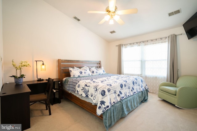 bedroom featuring ceiling fan, vaulted ceiling, and carpet