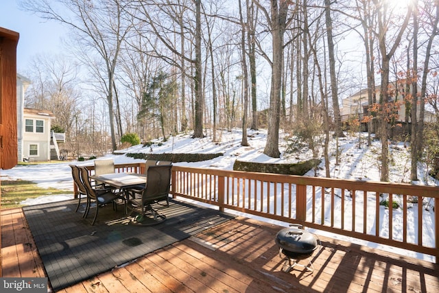 view of snow covered deck