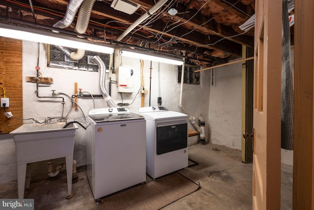 laundry room featuring washer and clothes dryer