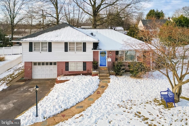 split level home with a garage