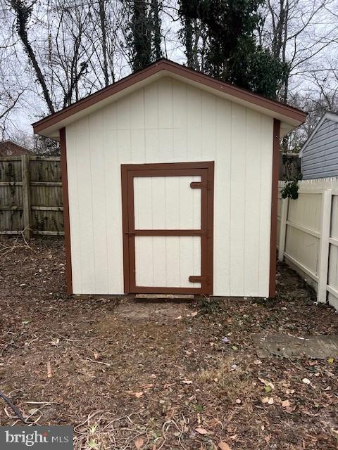 view of shed featuring a fenced backyard