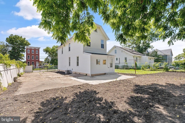 back of property featuring a patio