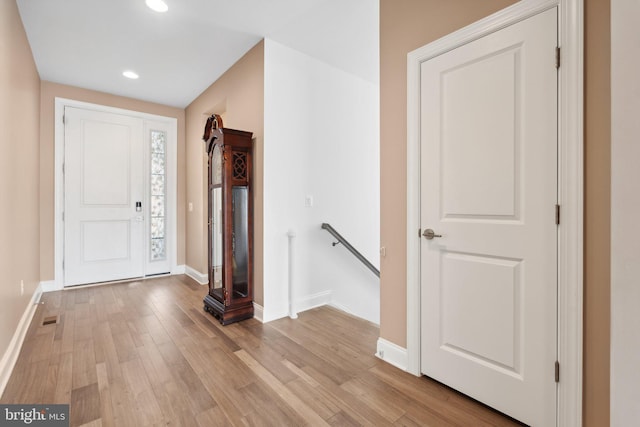 foyer entrance with light wood-type flooring