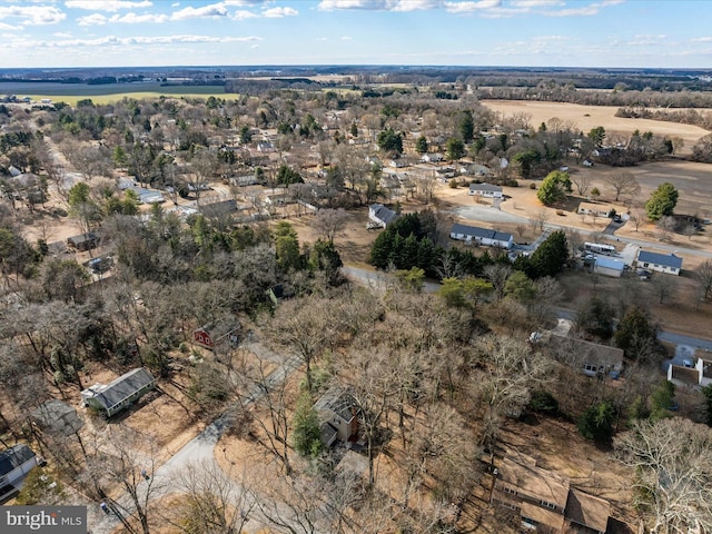 birds eye view of property with a rural view