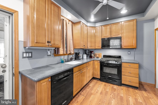 kitchen with ceiling fan, light hardwood / wood-style floors, sink, and black appliances