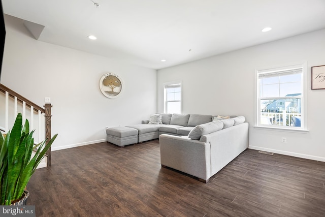 living room featuring dark hardwood / wood-style floors