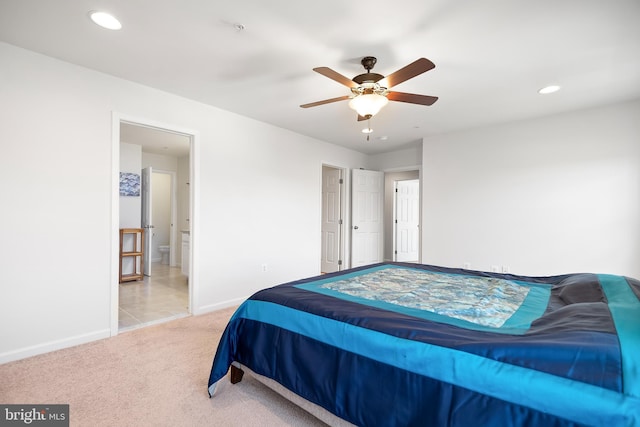 bedroom featuring ceiling fan and light colored carpet