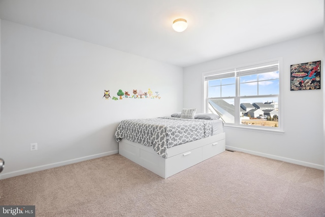 bedroom featuring carpet flooring