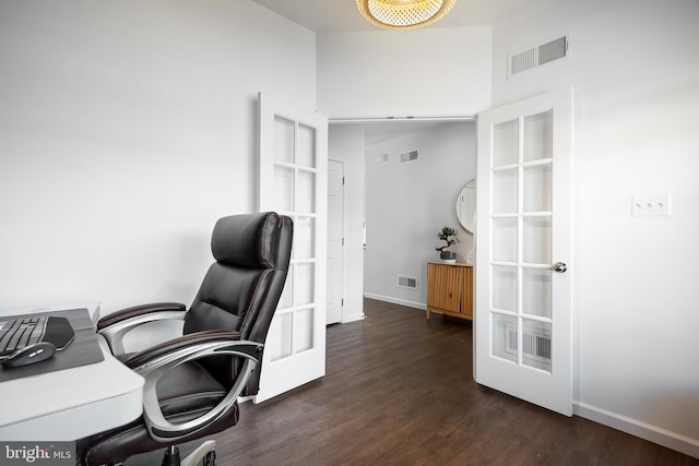 office featuring french doors and dark hardwood / wood-style flooring