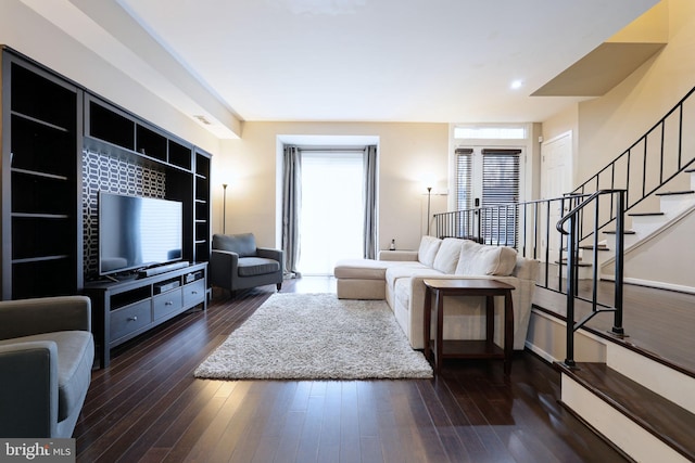 living room featuring dark hardwood / wood-style floors