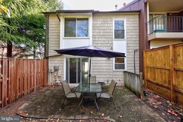 back of house featuring a patio area