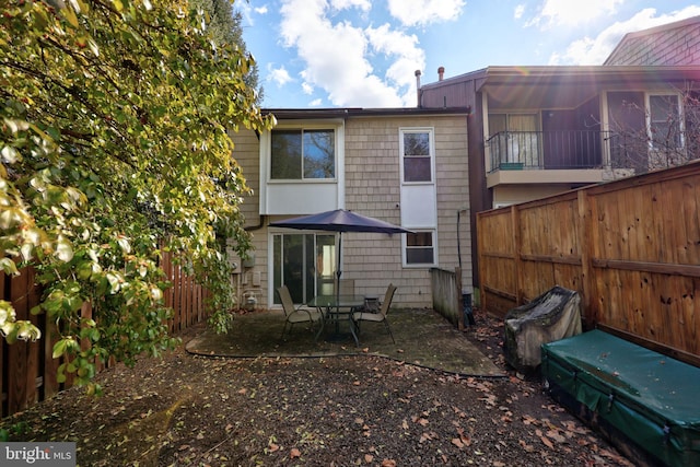 rear view of house featuring a patio area