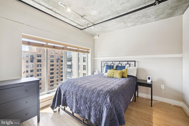 bedroom featuring light hardwood / wood-style flooring