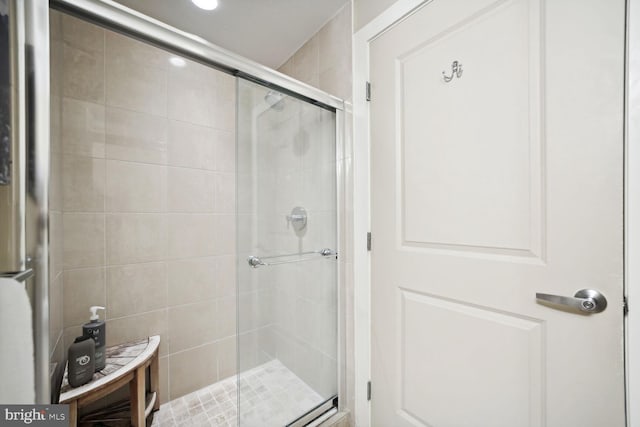 bathroom featuring an enclosed shower