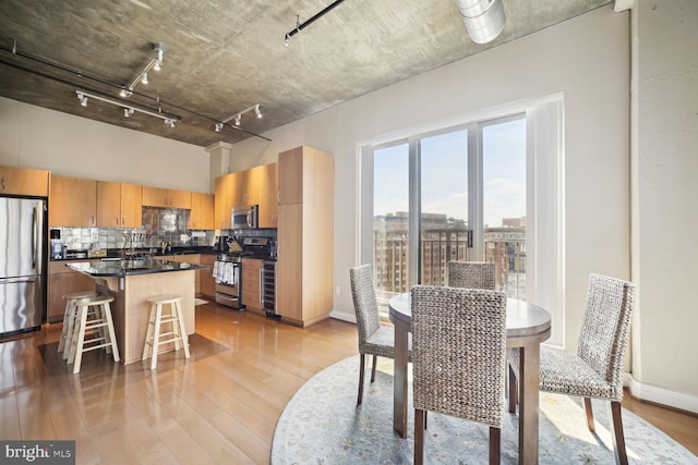 dining area featuring light hardwood / wood-style flooring