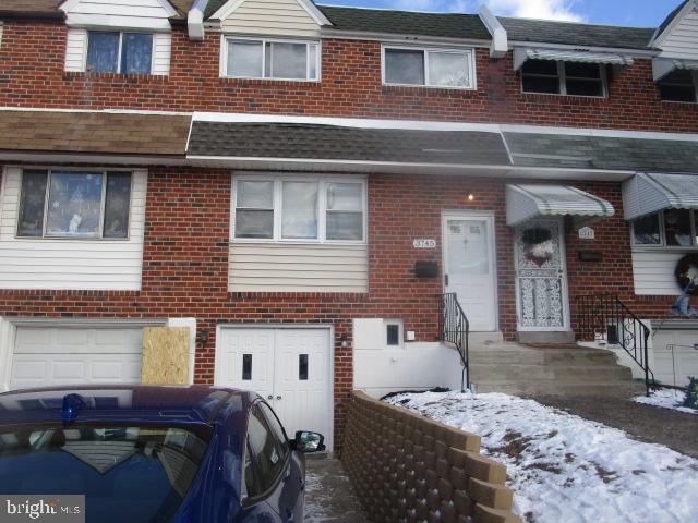 3745 Bandon Dr, Philadelphia, PA 19154 - townhome / multi-family property with a garage