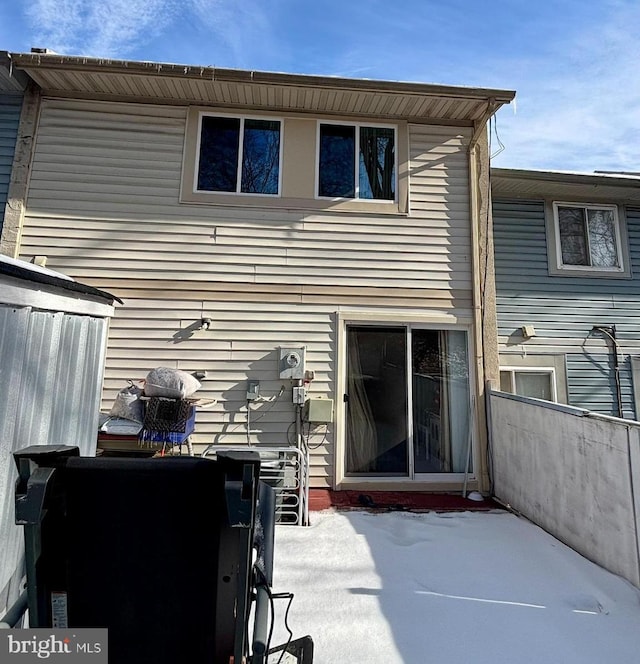 back of house with a patio area