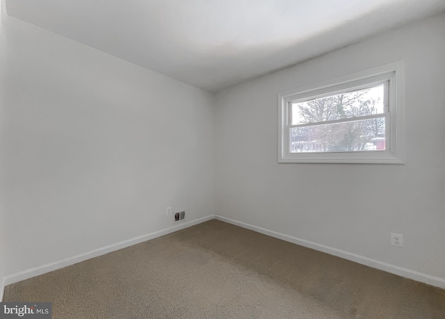 unfurnished room with carpet