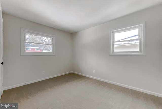 view of carpeted spare room