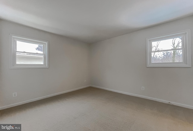 view of carpeted spare room