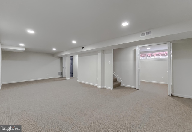 basement with carpet floors