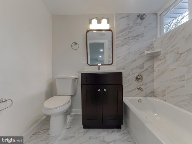 full bathroom featuring vanity, toilet, and tiled shower / bath combo