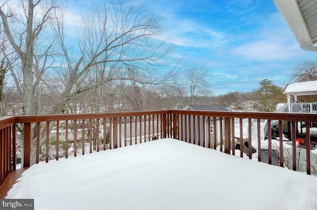 view of snow covered deck