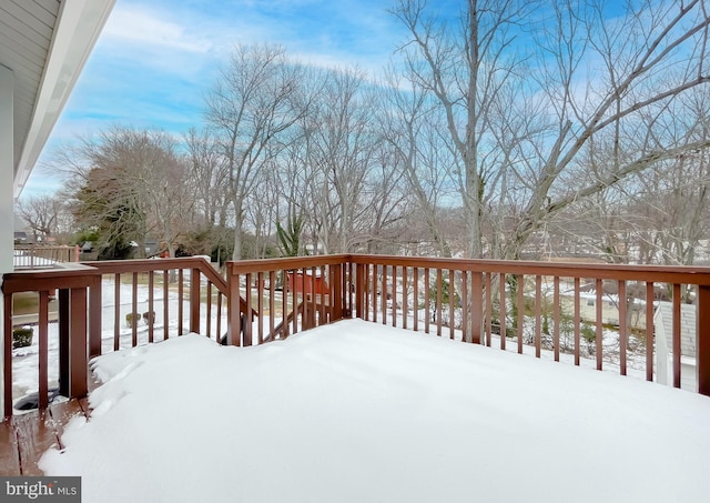 view of snow covered deck