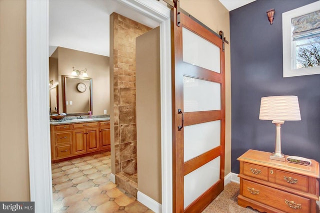 hallway featuring a barn door