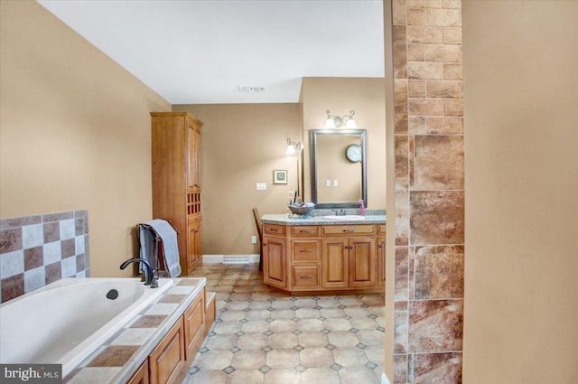 bathroom featuring vanity and a bathing tub