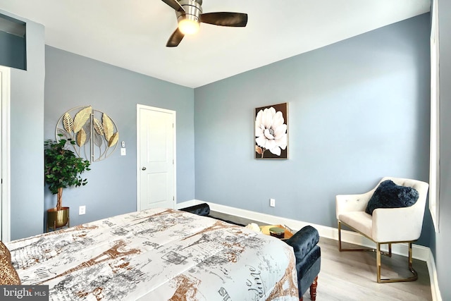 bedroom featuring ceiling fan and light wood-type flooring