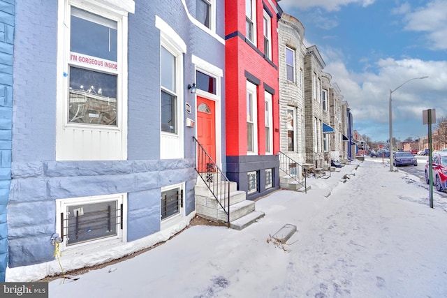 view of snow covered building