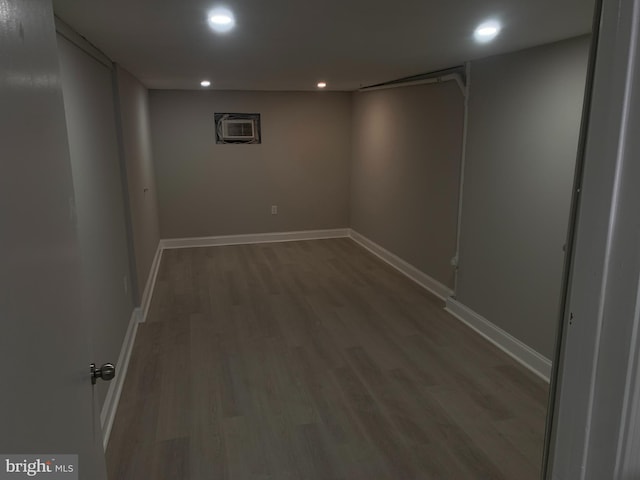 basement featuring hardwood / wood-style flooring