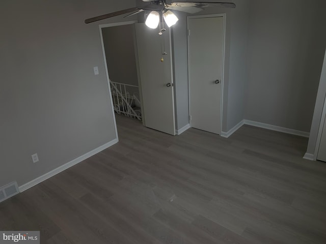 unfurnished room with hardwood / wood-style flooring and ceiling fan