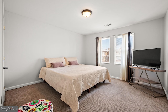 bedroom featuring carpet