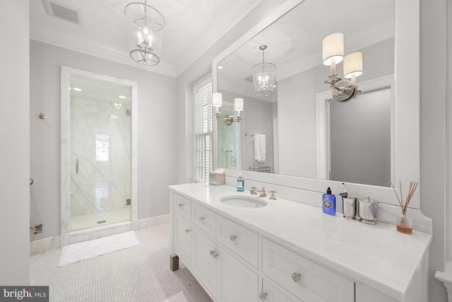 bathroom featuring vanity, a shower with shower door, tile patterned floors, and crown molding