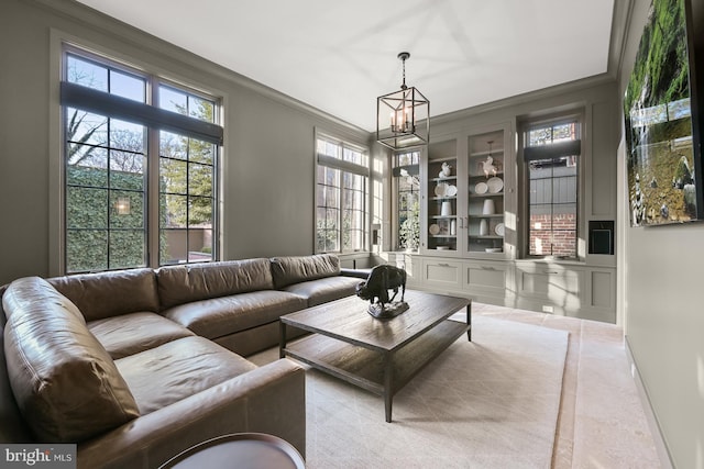 living room with ornamental molding