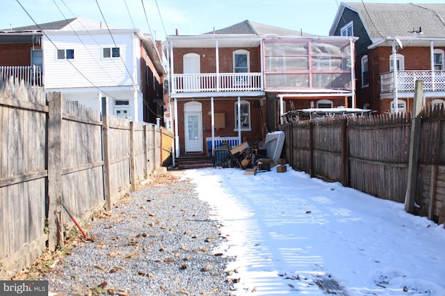 view of snow covered house