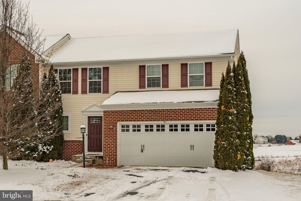 view of front of property with a garage