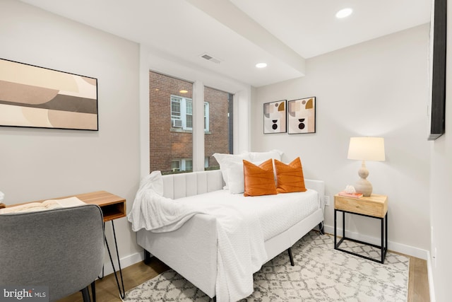 bedroom with light hardwood / wood-style flooring