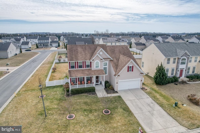 drone / aerial view with a residential view