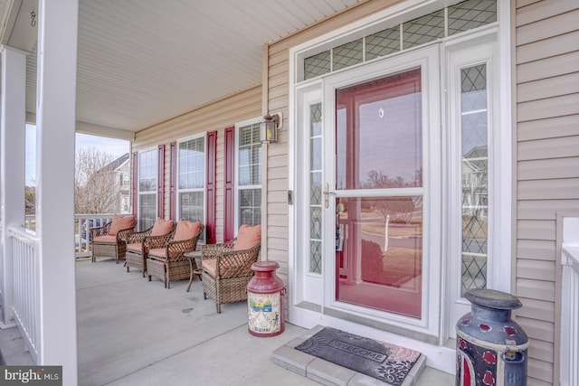 property entrance featuring covered porch