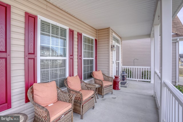 view of patio featuring a porch