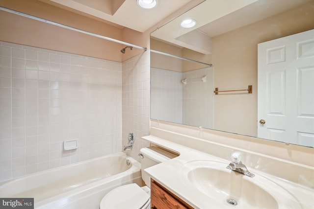 full bath with recessed lighting, shower / bath combination, vanity, and toilet